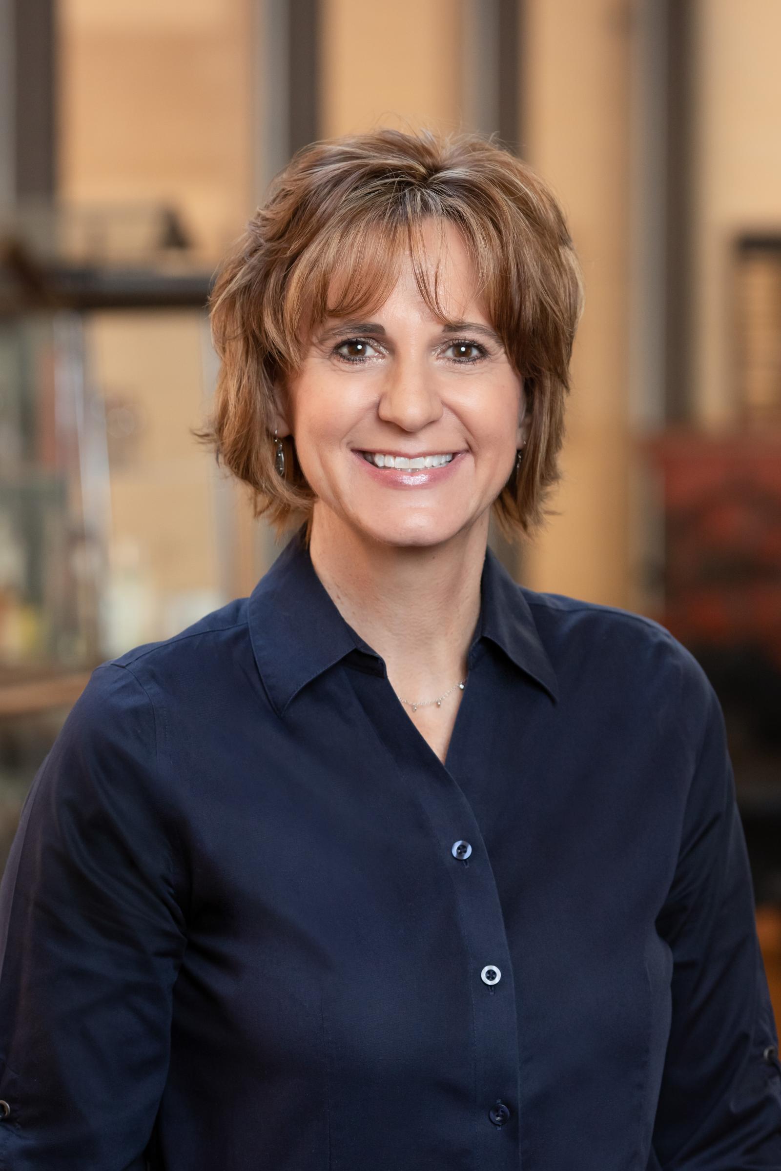 Headshot of Renee Acosta.